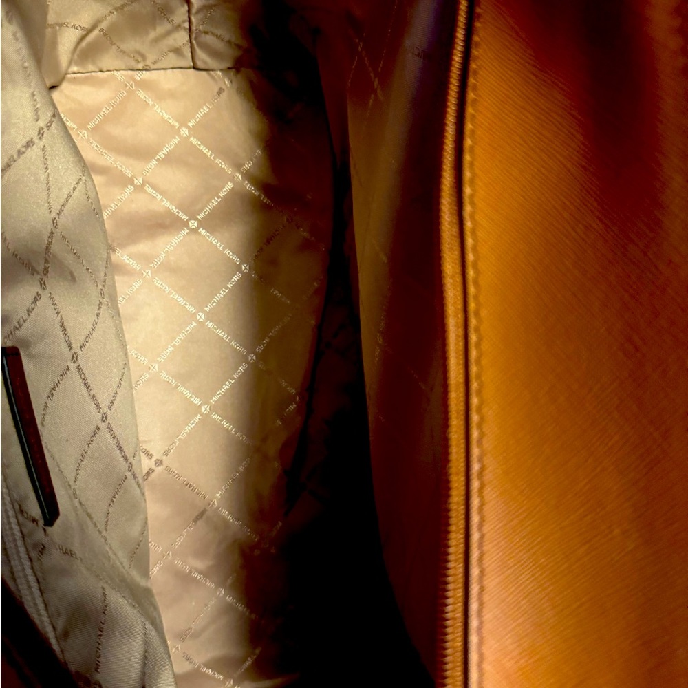 Beautiful bag.. new without tags. Just to big for me. Bought at Michael Kors